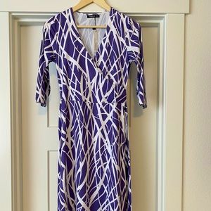 Small purple print wrap dress. New with tags.